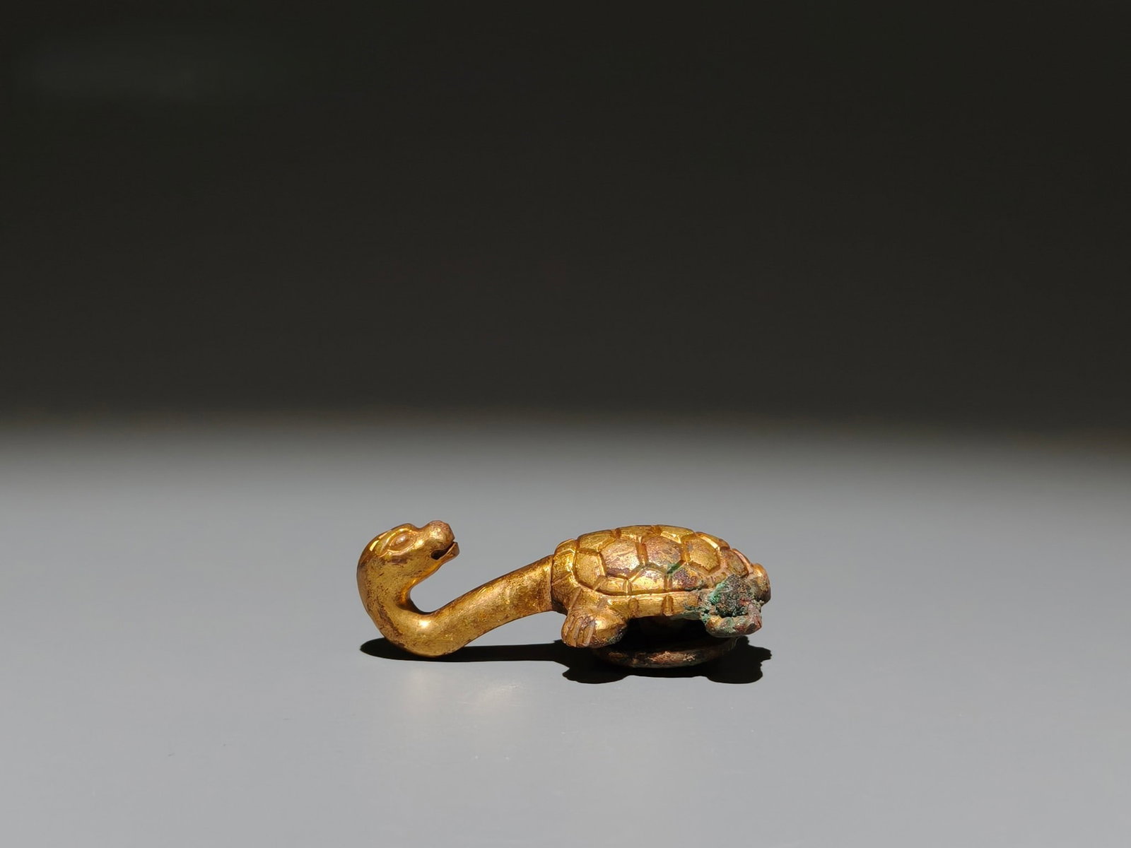 A Exquisite Gilt Bronze Turtle Handheld Carving: A Exquisite Gilt Bronze Turtle Handheld Carving,Han Dynasty, China,Size:2.5inx1.2in,Weight:g 铜鎏金龟手把件,中国汉代
