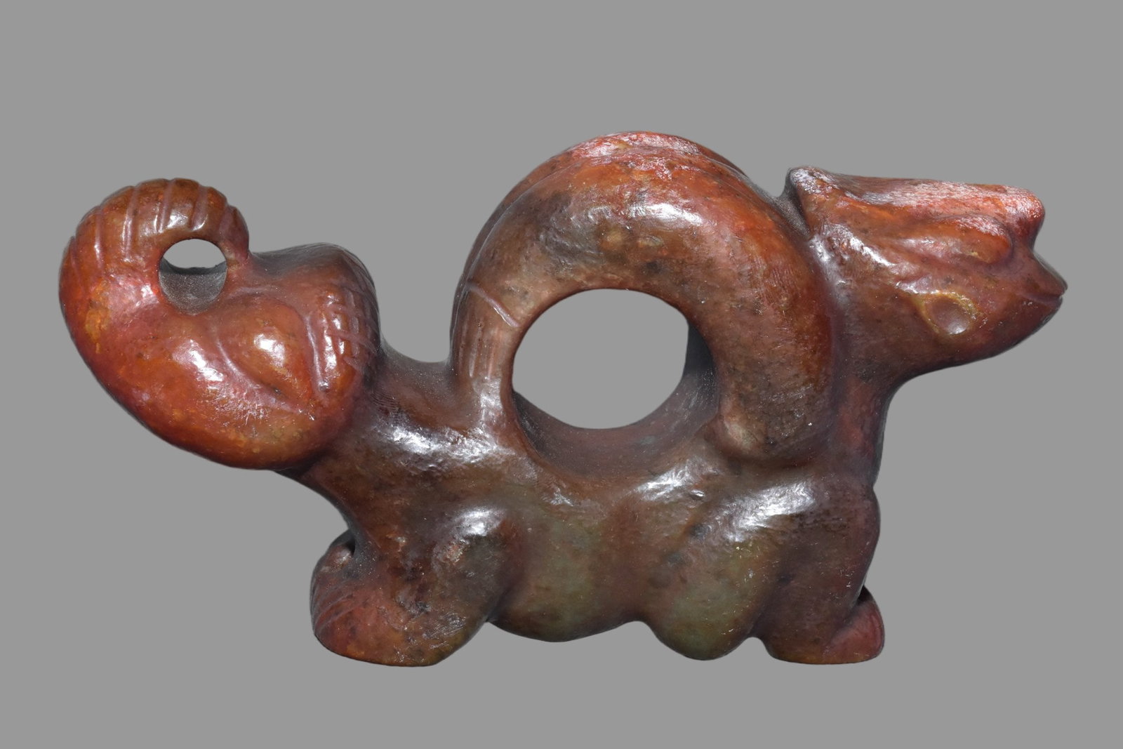 A Exquisite Hemoyu Ornament: A Exquisite Hemoyu Ornament,Ancient Time, China,Size:6.7inx4.3in,Weight:1040g 河磨玉摆件,远古时期