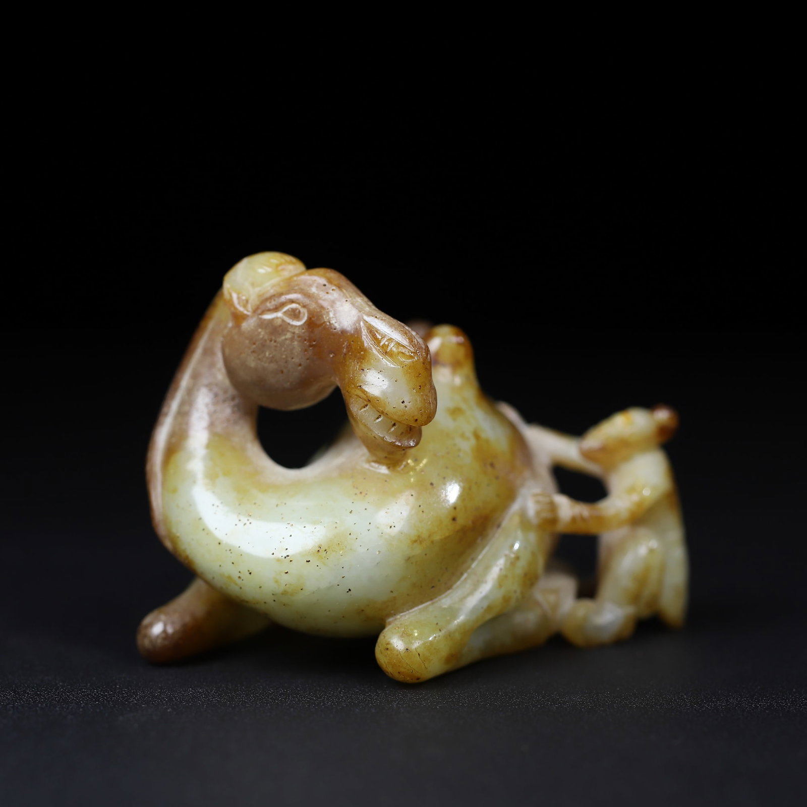 A Exquisite Hotan Jade Camel Ornament: A Exquisite Hotan Jade Camel Ornament,Han Dynasty, China,Size:2.8inx2.2inx1.9in,Weight:147.4g 和田玉骆驼摆件,中国汉代