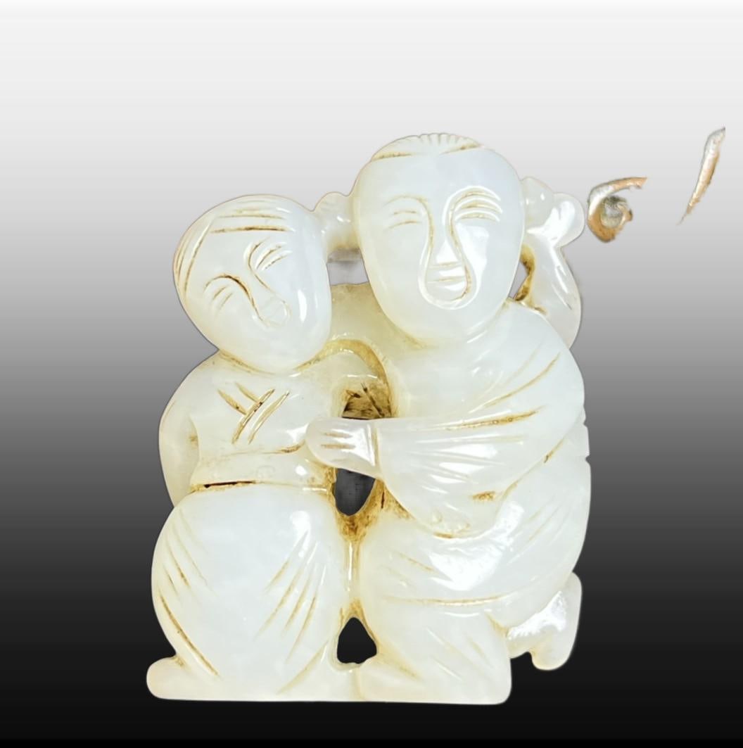 A Exquisite Hotan Jade Figures Pendant: A Exquisite Hotan Jade Figures Pendant,Qing Dynasty, China,Size:1.6inx0.6inx1.3in,Weight:26g 和田玉人形挂件,中国清代