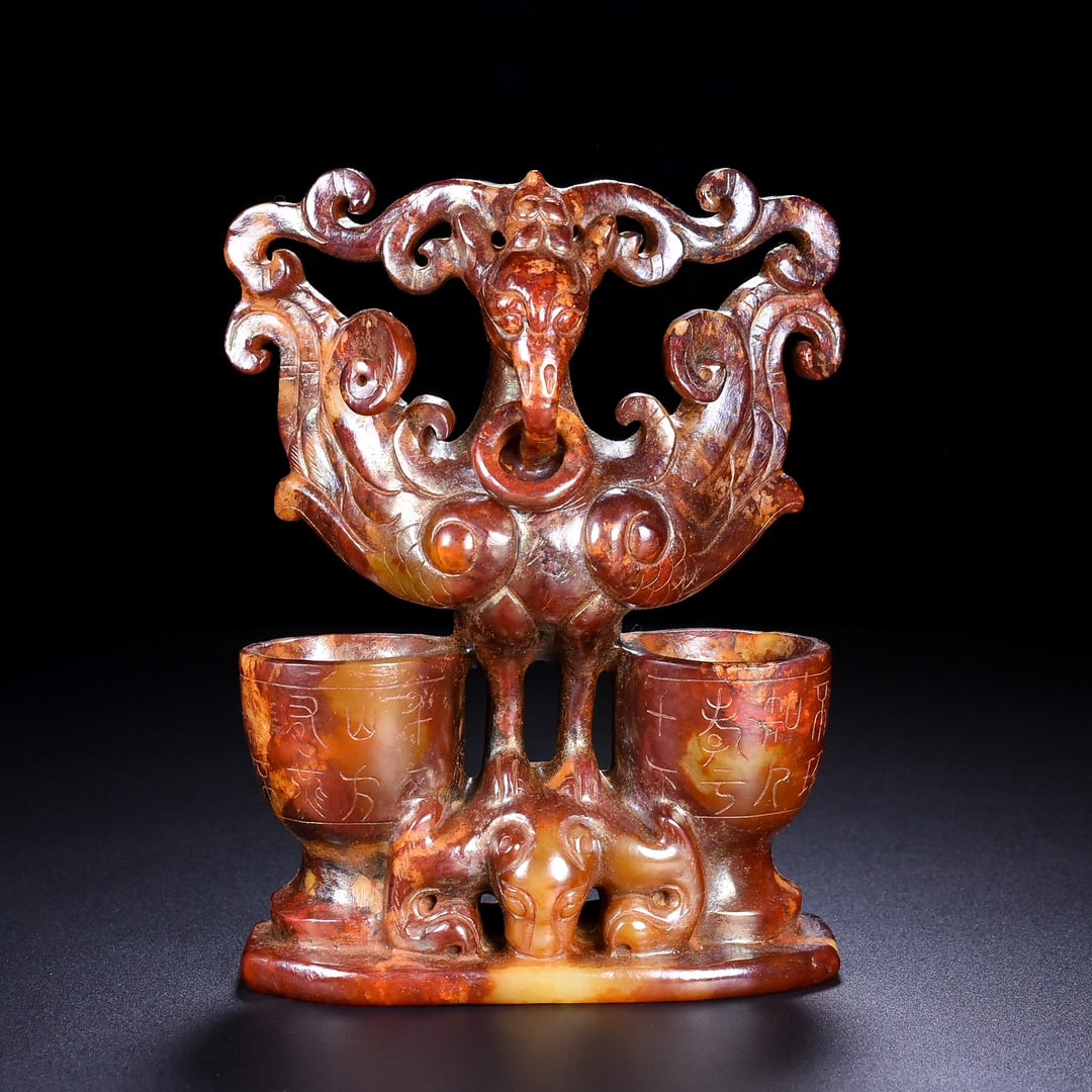 A Exquisite Hotan Jade Phoenix Candlestick: A Exquisite Hotan Jade Phoenix Candlestick,Han Dynasty, China,Size:5.9inx2.4inx7.1in,Weight:1398g 和田玉凤蜡台,中国汉代