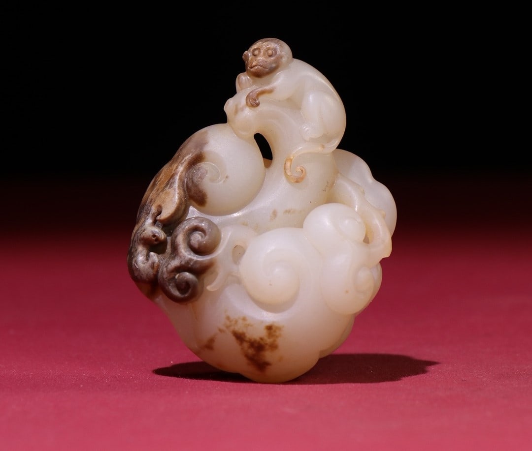 A Exquisite Hetian White Jade Ruyi Pendant: A Exquisite Hetian White Jade Ruyi Pendant,Han Dynasty, China,Size:2.4inx1.7inx0.8in,Weight:55g 和田白玉如意吊坠,中国汉代