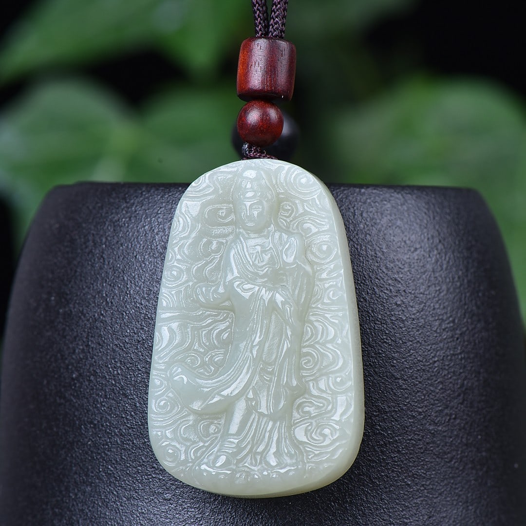 A Exquisite Hotan Jade Statue of Avalokitesvara Pendant: A Exquisite Hotan Jade Statue of Avalokitesvara Pendant,Size:1.1inx1.8in 和田玉观音吊坠