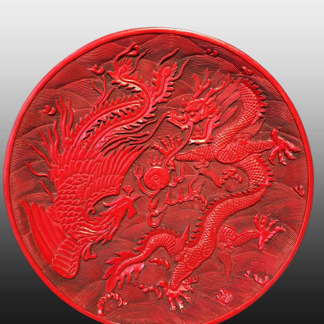A Exquisite Carved Red Lacquer Dragon Pattern Plate: A Exquisite Carved Red Lacquer Dragon Pattern Plate,Qing Dynasty, China,Size:9.4inx9.4in ,Weight:545g 漆器剔红龙纹盘,中国清代