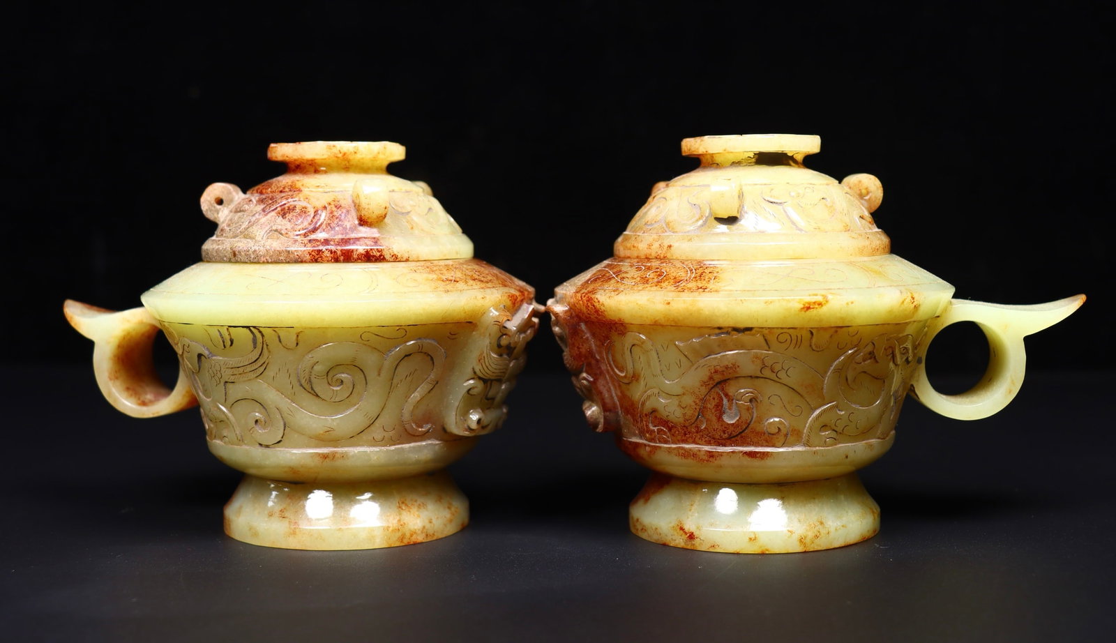 A pair of Exquisite Hotan Jade Cup: A pair of Exquisite Hotan Jade Cup,Han Dynasty, China,Size:8.7inx2.4inx15.3in,Weight:4724g 一对和田玉杯,中国汉代