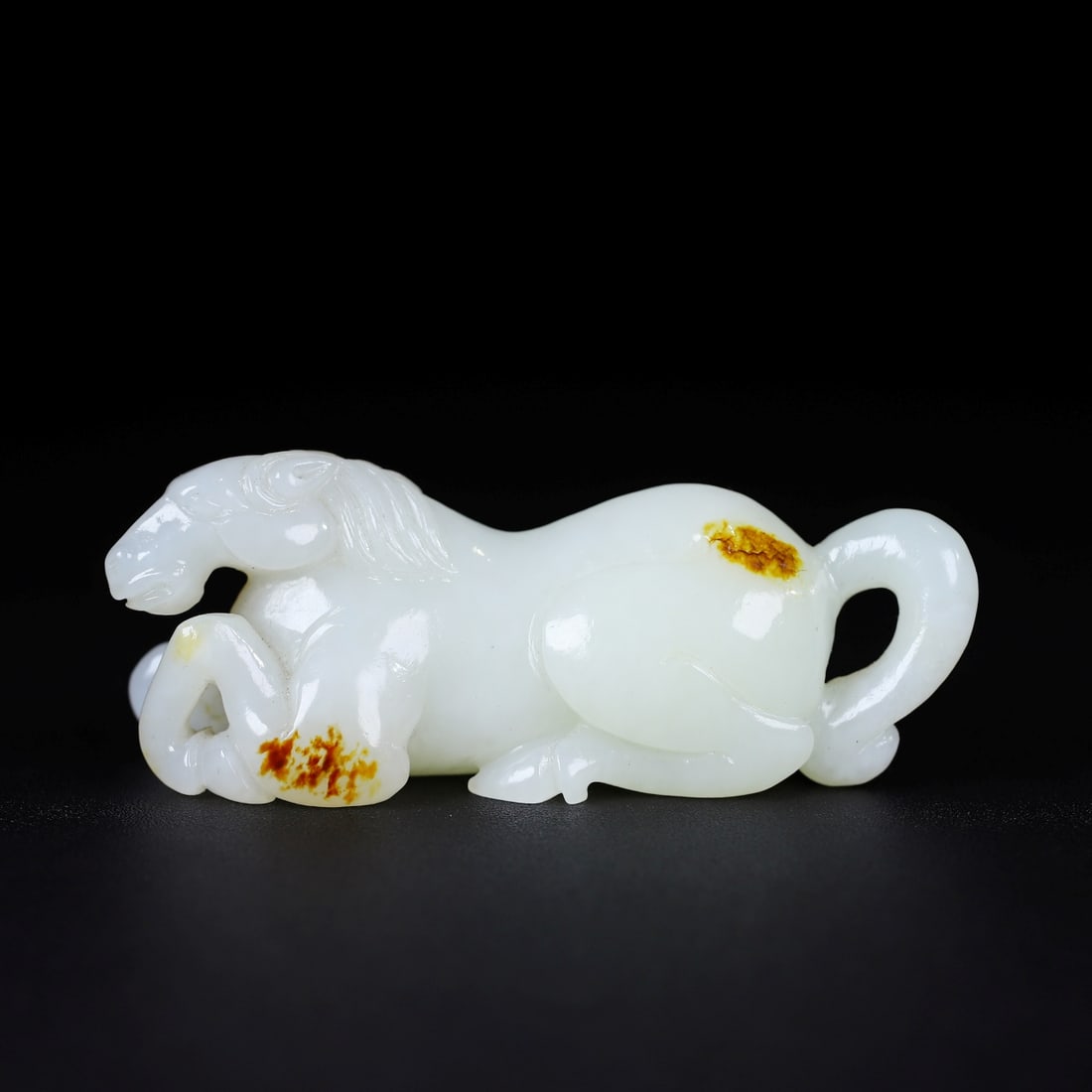 A Exquisite Hotan Jade Horse Ornament: A Exquisite Hotan Jade Horse Ornament,Ming Dynasty, China,Size:3.7inx1.3inx1.4in,Weight:114.8g 和田玉马摆件,中国明代
