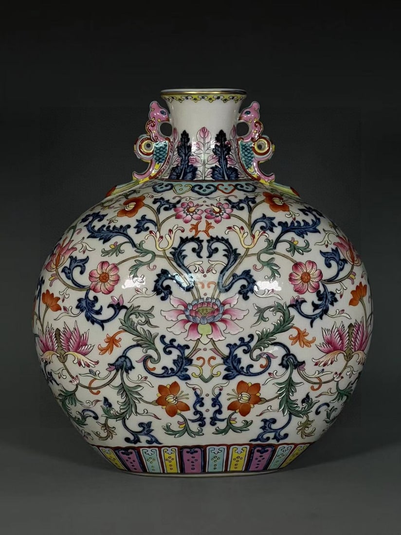 A Exquisite Wucai Lotus Pattern Vase: A Exquisite Wucai Lotus Pattern Vase,Qing Dynasty, China,Qianlong Six-character Mark,Size:11.7inx2.6inx5.1in 五彩缠枝莲纹瓶,中国清代,&