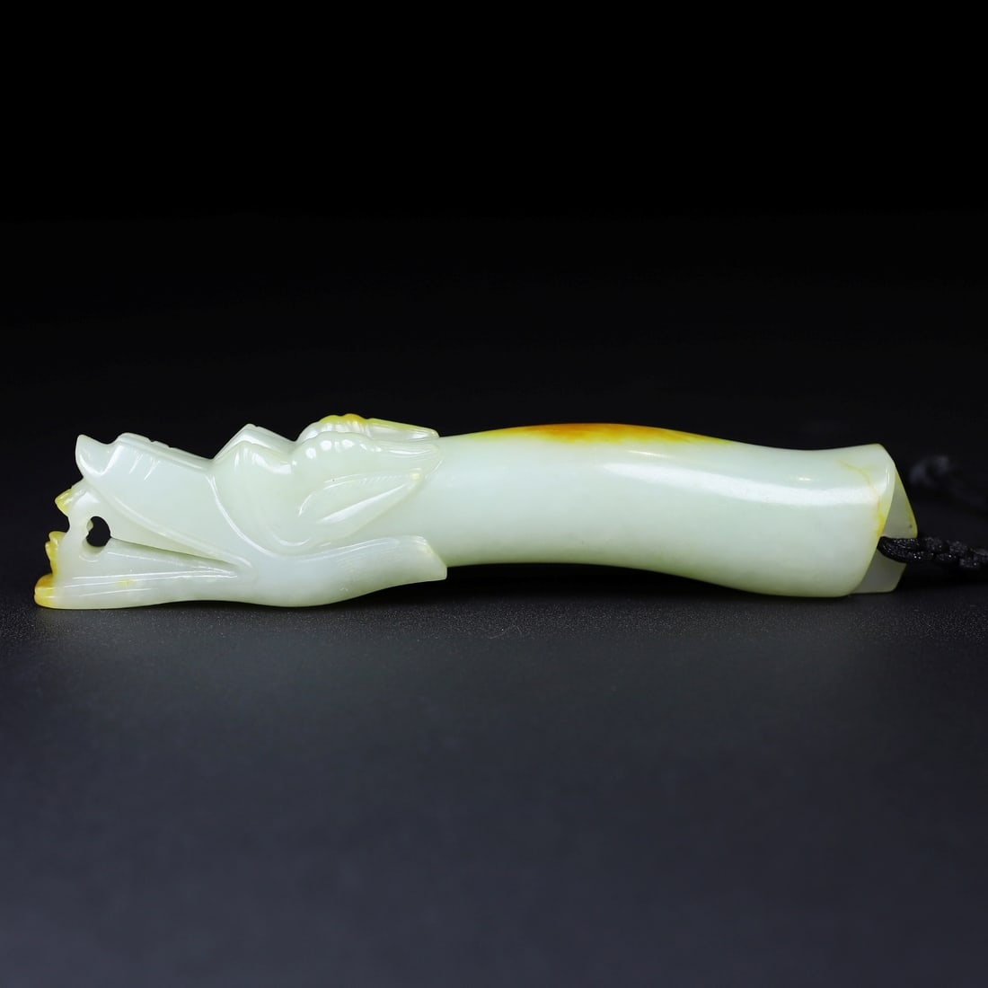 A Exquisite Hotan Jade Dragon head Ornament: A Exquisite Hotan Jade Dragon head Ornament,Yuan Dynasty, China,Size:5.5inx0.8inx1.1in,Weight:149.7g 和田玉龙头摆件,中国元代