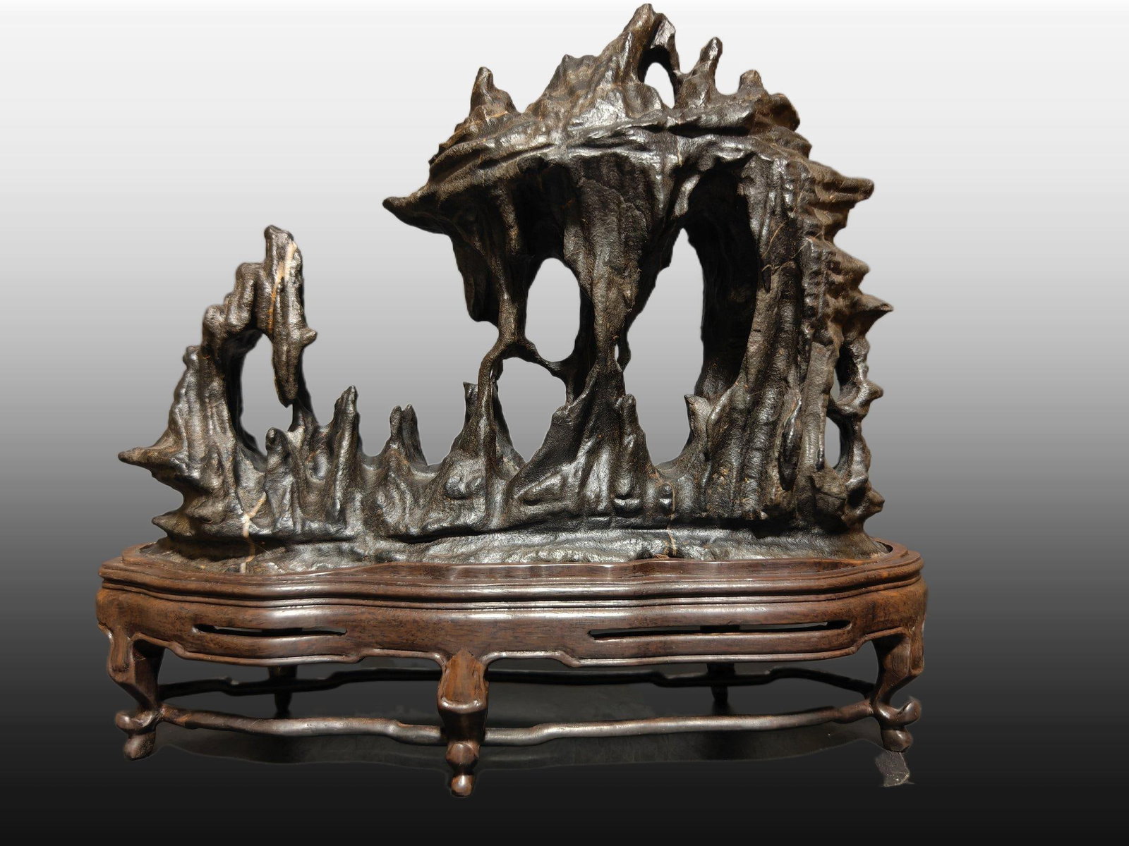A Exquisite Lingbi Stone Mountain Ornament: A Exquisite Lingbi Stone Mountain Ornament,Qing Dynasty, China,Size:15inx4.7inx13in,Weight:6400g 灵璧石山形摆件,中国清代