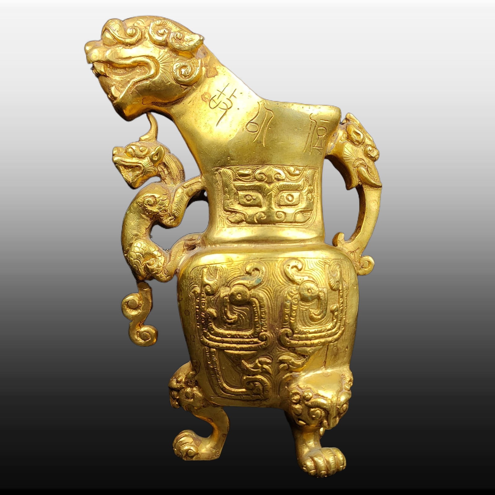 A Exquisite Gilt Bronze Animal-shaped Vase: A Exquisite Gilt Bronze Animal-shaped Vase,Han Dynasty, China,Size:5.5inx3.5in,Weight:1038g 铜鎏金兽形瓶,中国汉代