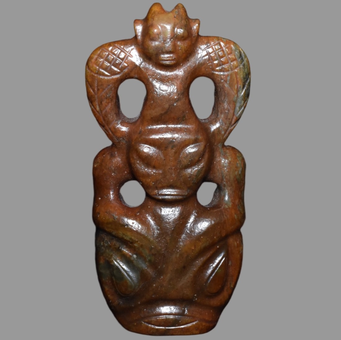 A Exquisite Hemoyu Sun God: A Exquisite Hemoyu Sun God,Ancient Time, China,Size:7.7inx4.1in,Weight:1380g 河磨玉太阳神,远古时期
