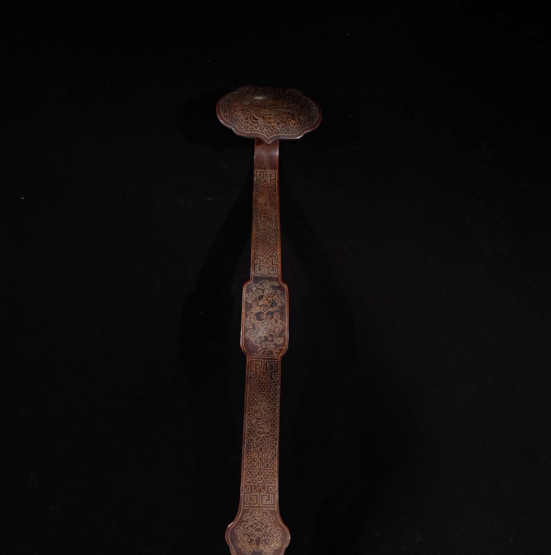 A Exquisite Red Copper Silver-Inlaid Ruyi Ornament: A Exquisite Red Copper Silver-Inlaid Ruyi Ornament,Qing Dynasty, China,Qianlong Six-character Mark,Size:20.9in,Weight:1525g
