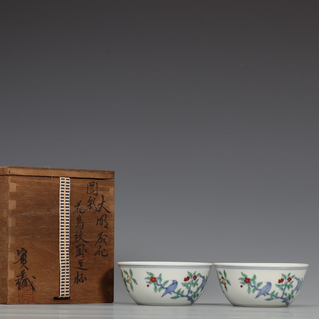 A pair of Exquisite Doucai Flower and Bird Pattern Cup: A pair of Exquisite Doucai Flower and Bird Pattern Cup,Ming Dynasty, China,Chenghua Six-character Mark,Size:1.7inx3.7in