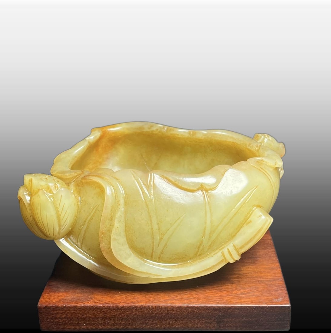 A Exquisite Hotan Yellow Jade Lotus Leaf Brush Washer: A Exquisite Hotan Yellow Jade Lotus Leaf Brush Washer,Qing Dynasty, China,Size:3.6inx1.4inx2.6in,Weight:209g