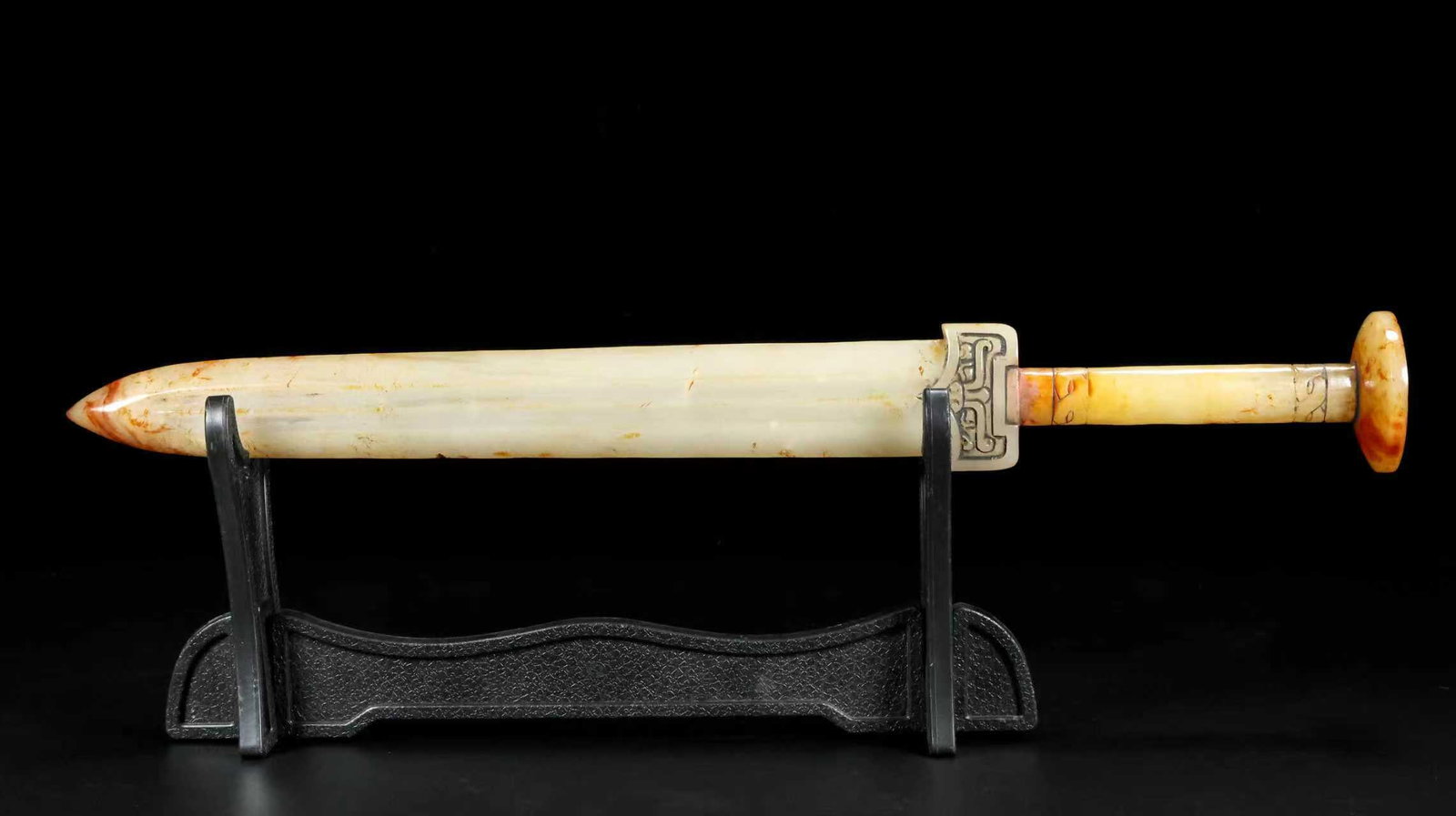 A Exquisite Hotan Jade Sword: A Exquisite Hotan Jade Sword,Han Dynasty, China,Size:16.1inx2inx2in,Weight:327.8g 和田玉剑,中国汉代