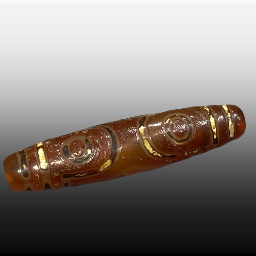 A Exquisite Ruby Six Eyes Dzi bead - 2