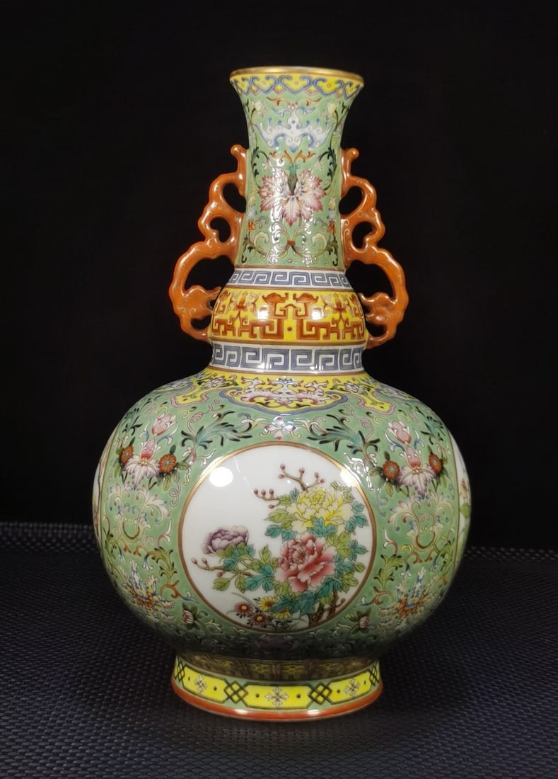 A Exquisite Enamel Green Ground Flower Pattern Double-Ears Vase: A Exquisite Enamel Green Ground Flower Pattern Double-Ears Vase,Qing Dynasty, China,Qianlong Six-character Mark,Size:13.8inx2.8inx9.1in