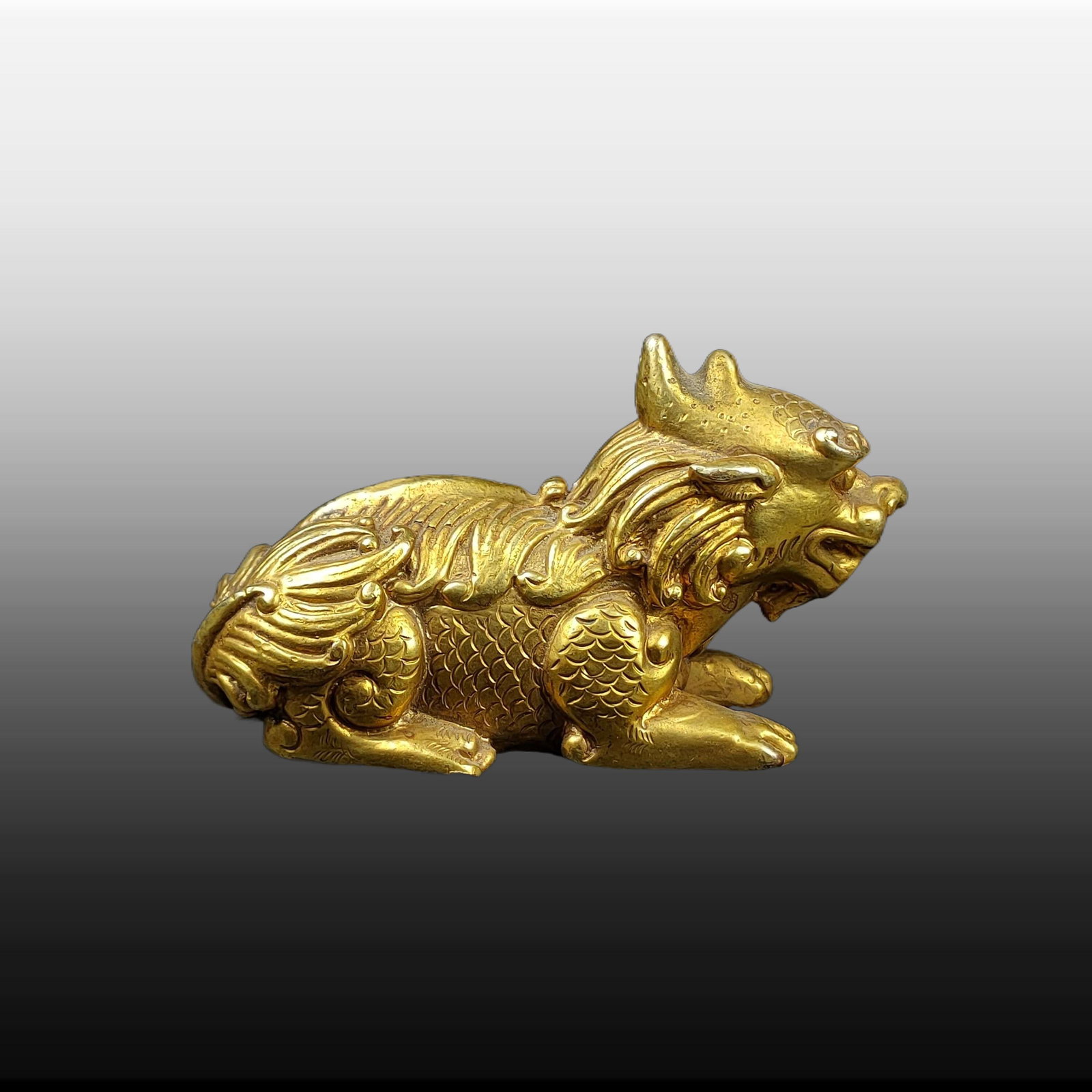 A Exquisite Gilt Bronze Kylin Paper Weight (1 of 7)