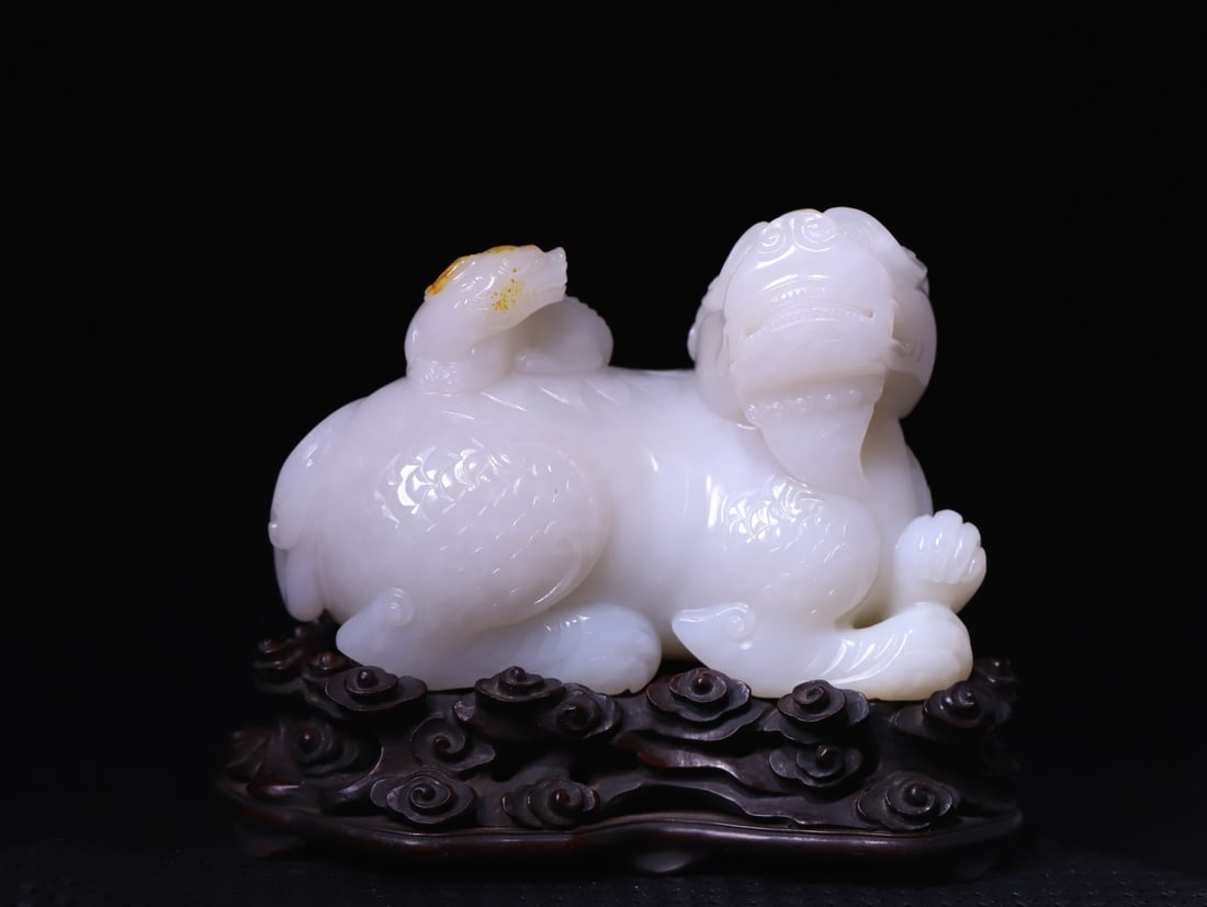 A Exquisite Hotan Jade Auspicious Beast Ornament (1 of 9)