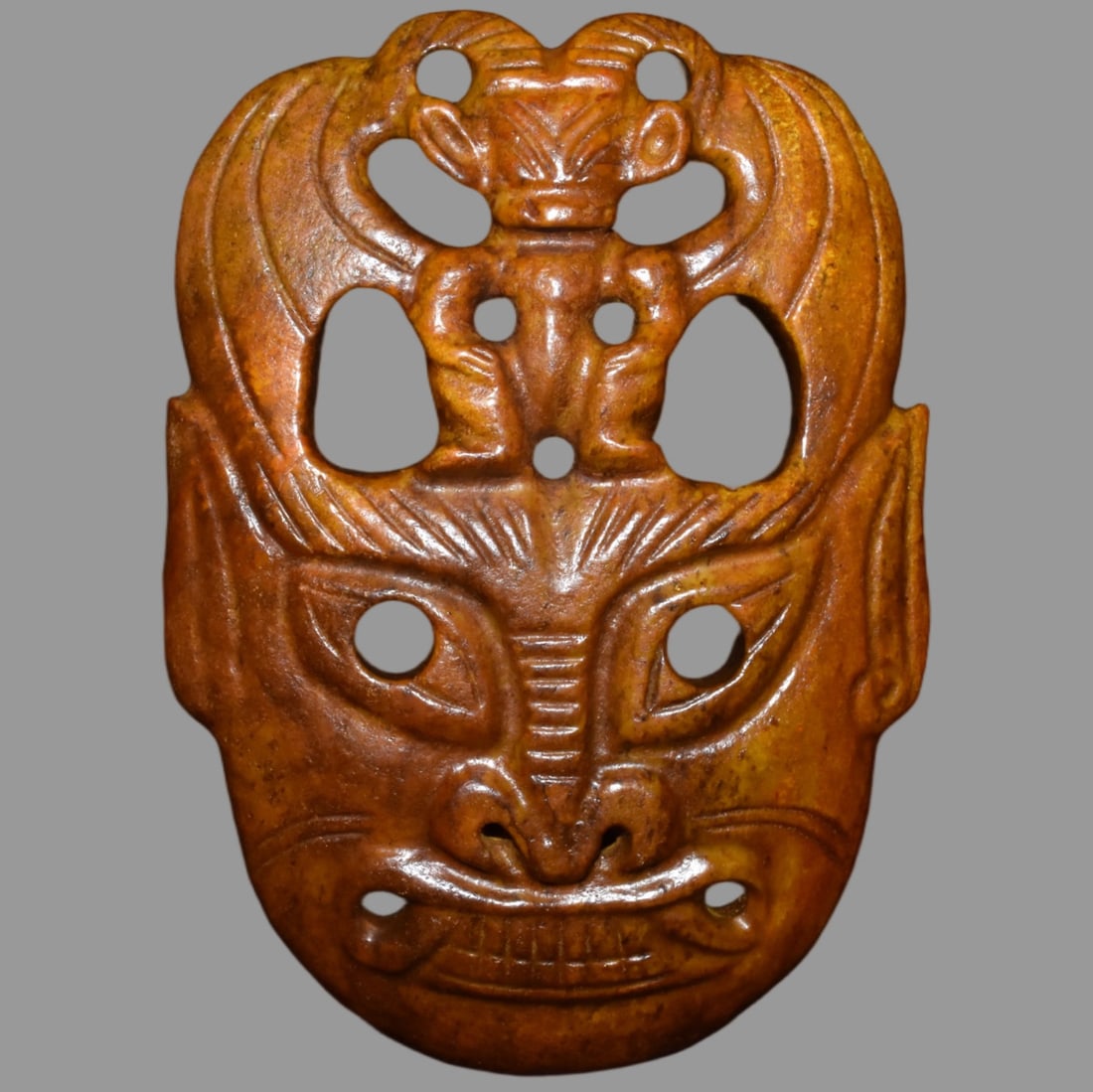 A Exquisite Hemoyu Facial Mask: A Exquisite Hemoyu Facial Mask,Ancient Time, China,Size:11.4inx8.3in,Weight:2100g 河磨玉脸谱,远古时期