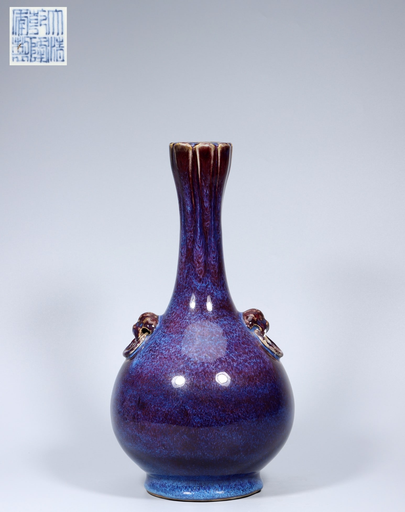 A Exquisite Flambe Glazed Lion-Ears Vase: A Exquisite Flambe Glazed Lion-Ears Vase,Qing Dynasty, China,Qianlong Six-character Mark,Size:13.6inx6.7inx1.6inx4.5in,Weight:2014g