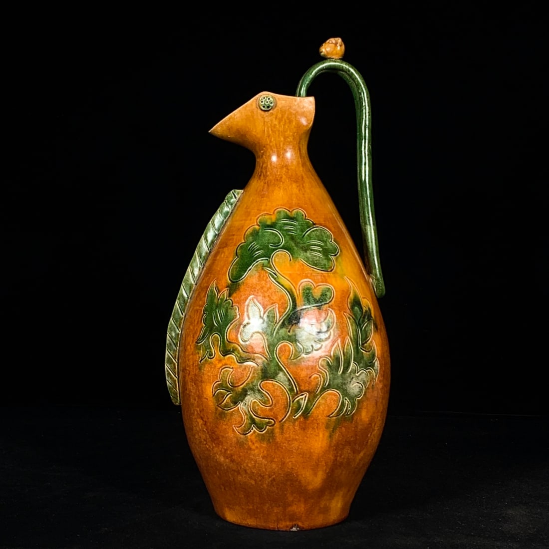 A Exquisite Tang Tri-Color Glazed Pottery Flower Pattern Ewer: A Exquisite Tang Tri-Color Glazed Pottery Flower Pattern Ewer,Tang Dynasty, China,Size:15.7inx7.1in 唐三彩花卉纹壶,中国唐代