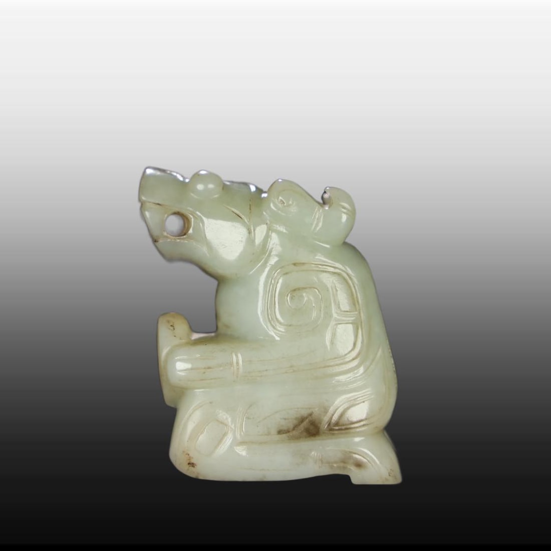 A Exquisite Hotan Jade Auspicious Beast Ornament: A Exquisite Hotan Jade Auspicious Beast Ornament,Han Dynasty, China,Size:1.7inx1inx2.2in,Weight:115g 和田玉瑞兽摆件,中国汉代