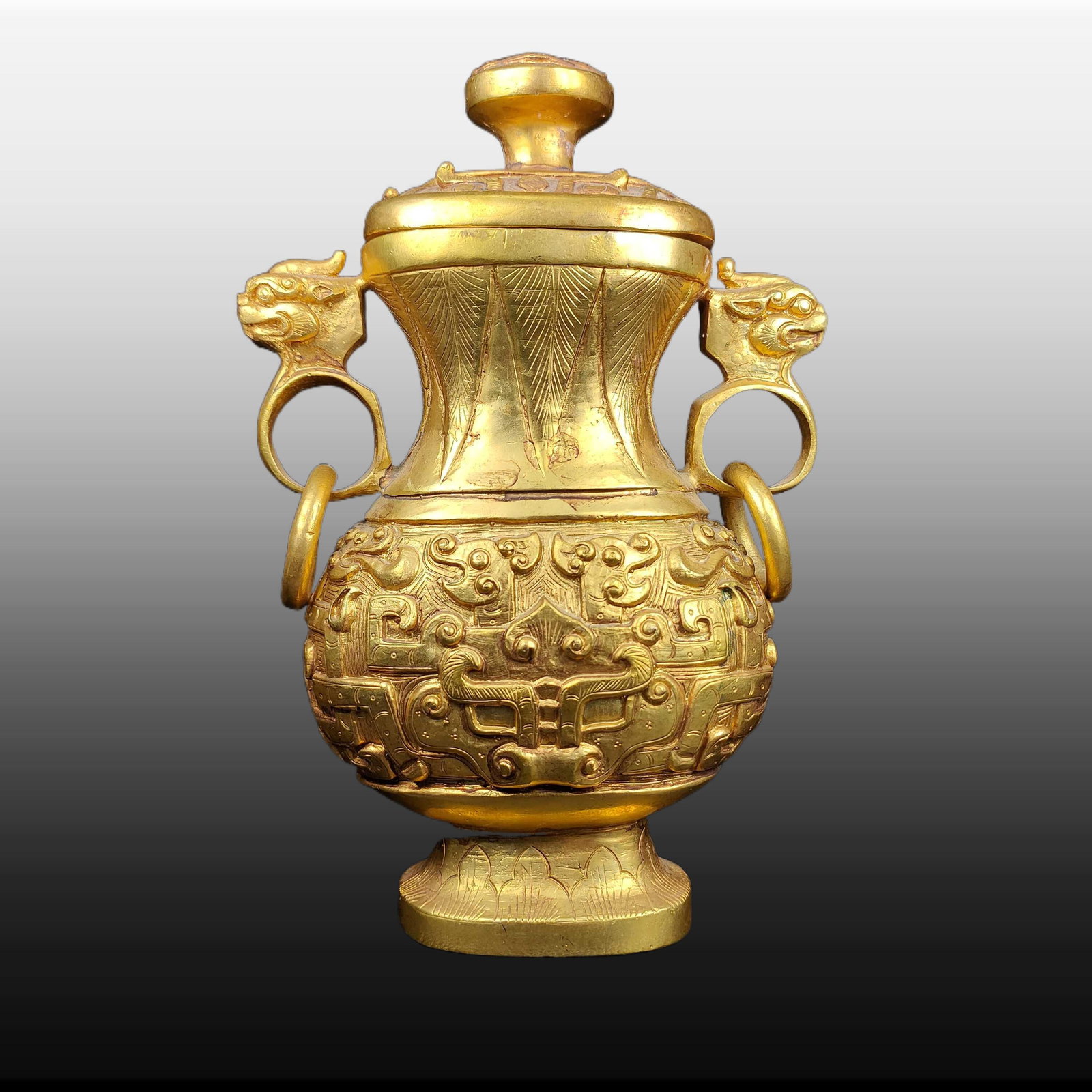 A Exquisite Gilt Bronze Beast-Face Pattern Double-Ears Vase: A Exquisite Gilt Bronze Beast-Face Pattern Double-Ears Vase,Han Dynasty, China,Size:7.1inx4.3in,Weight:1106g