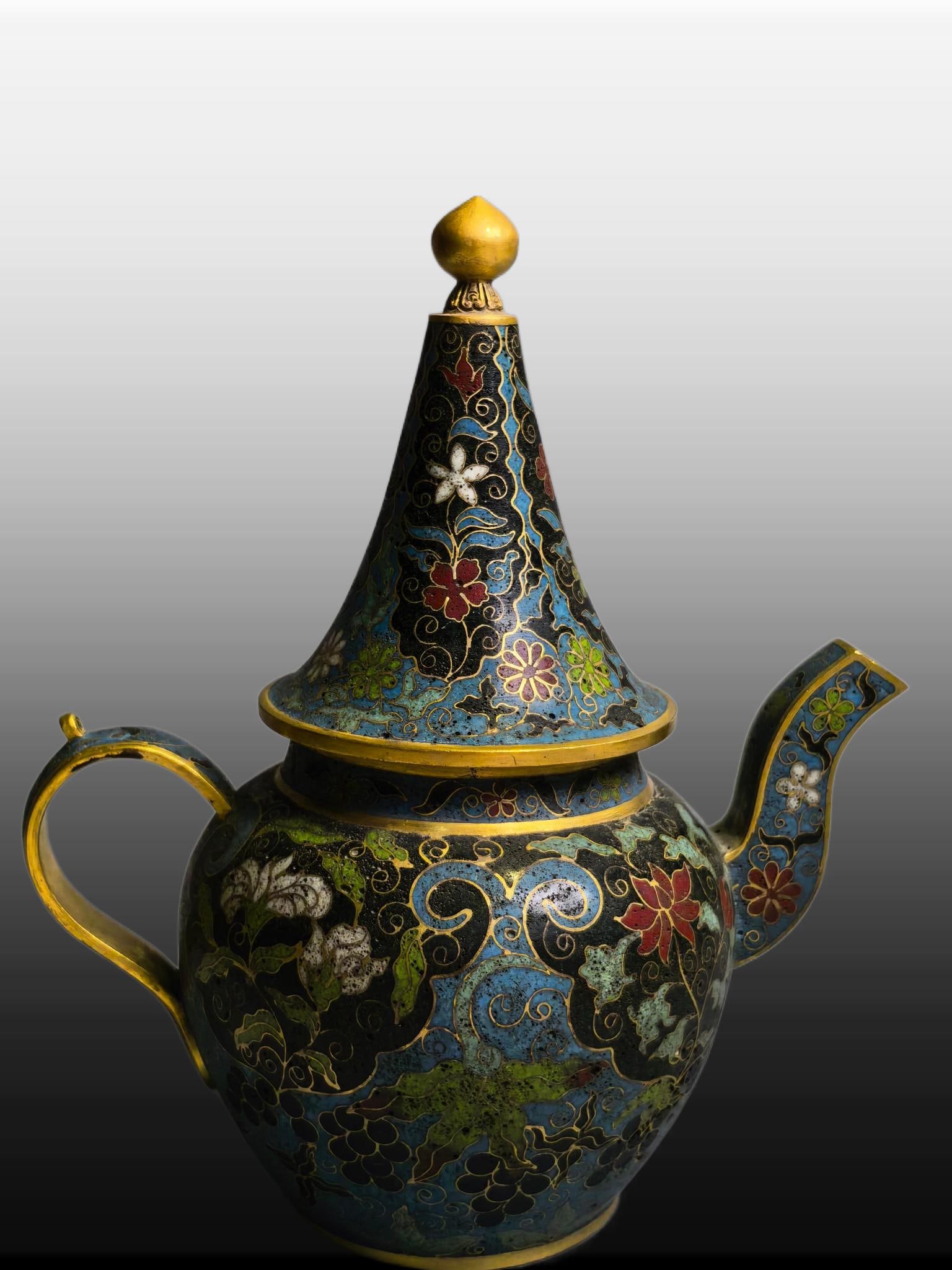 A Exquisite Cloisonne Lotus Pattern Ewer: A Exquisite Cloisonne Lotus Pattern Ewer,Ming Dynasty, China,Jingtai Four-character Mark,Size:6.3inx3.9inx7.5in,Weight:720g