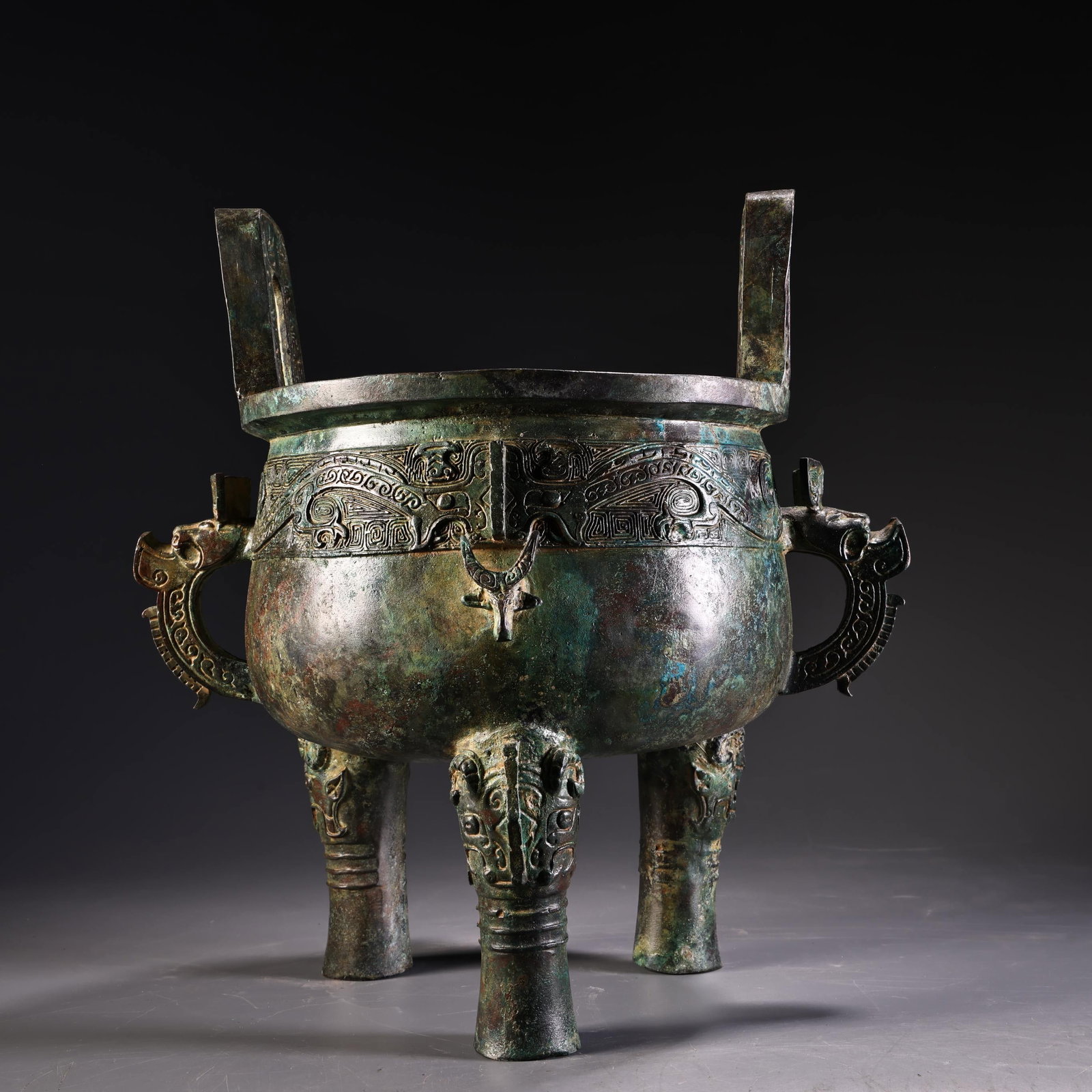 A Exquisite Bronze Double-Ears and Tripod Censer: A Exquisite Bronze Double-Ears and Tripod Censer,Ancient Time, China,Size:11.8inx11.4in ,Weight:3900g 青铜双耳三足炉,远古时期