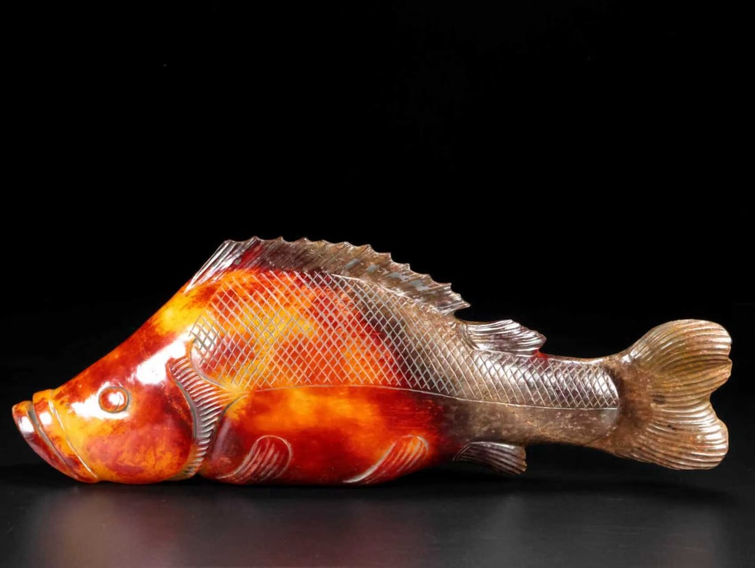 A Exquisite Hotan Jade Fish Ornament: A Exquisite Hotan Jade Fish Ornament,Han Dynasty, China,Size:11.4inx2.4inx4.3in,Weight:1431g 和田玉鱼摆件,中国汉代