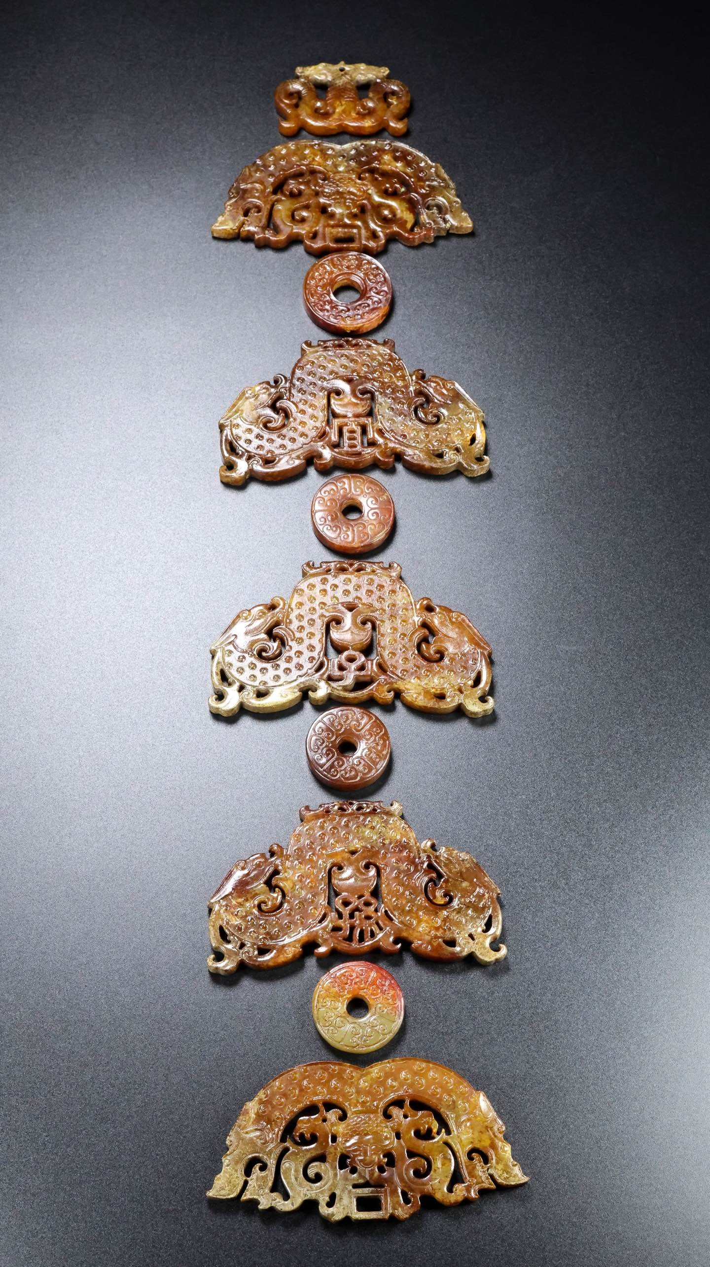 A Set of Exquisite Hotan Jade Bi: A Set of Exquisite Hotan Jade Bi,Han Dynasty, China,Size:19.7inx3.9inx0.2in,Weight:270g 一套和田玉玉璧,中国汉代
