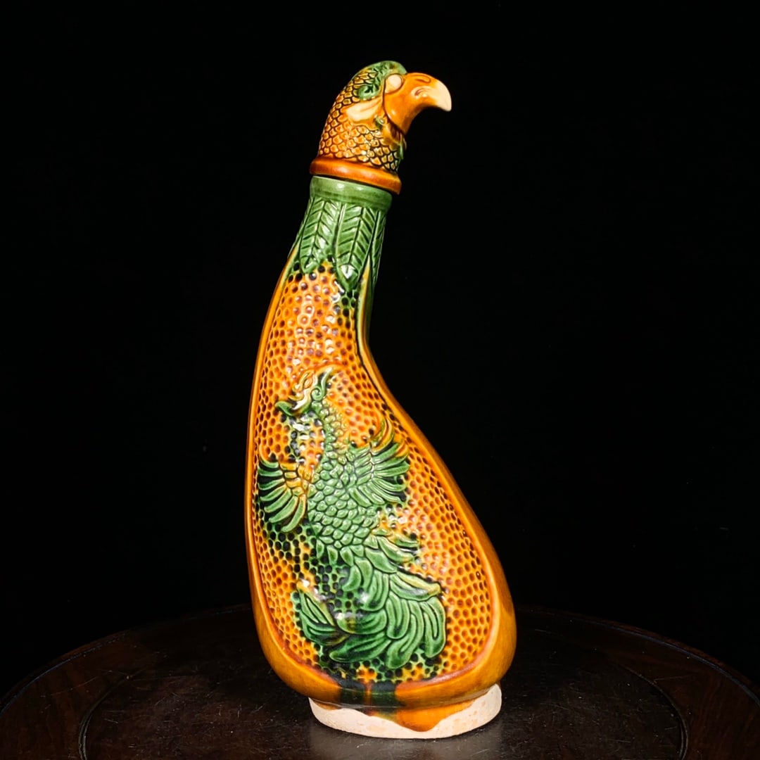 A Exquisite Tang Tri-Color Glazed Pottery Phoenix Pattern Eagle Head Ewer: A Exquisite Tang Tri-Color Glazed Pottery Phoenix Pattern Eagle Head Ewer,Tang Dynasty, China,Size:11inx4.3in