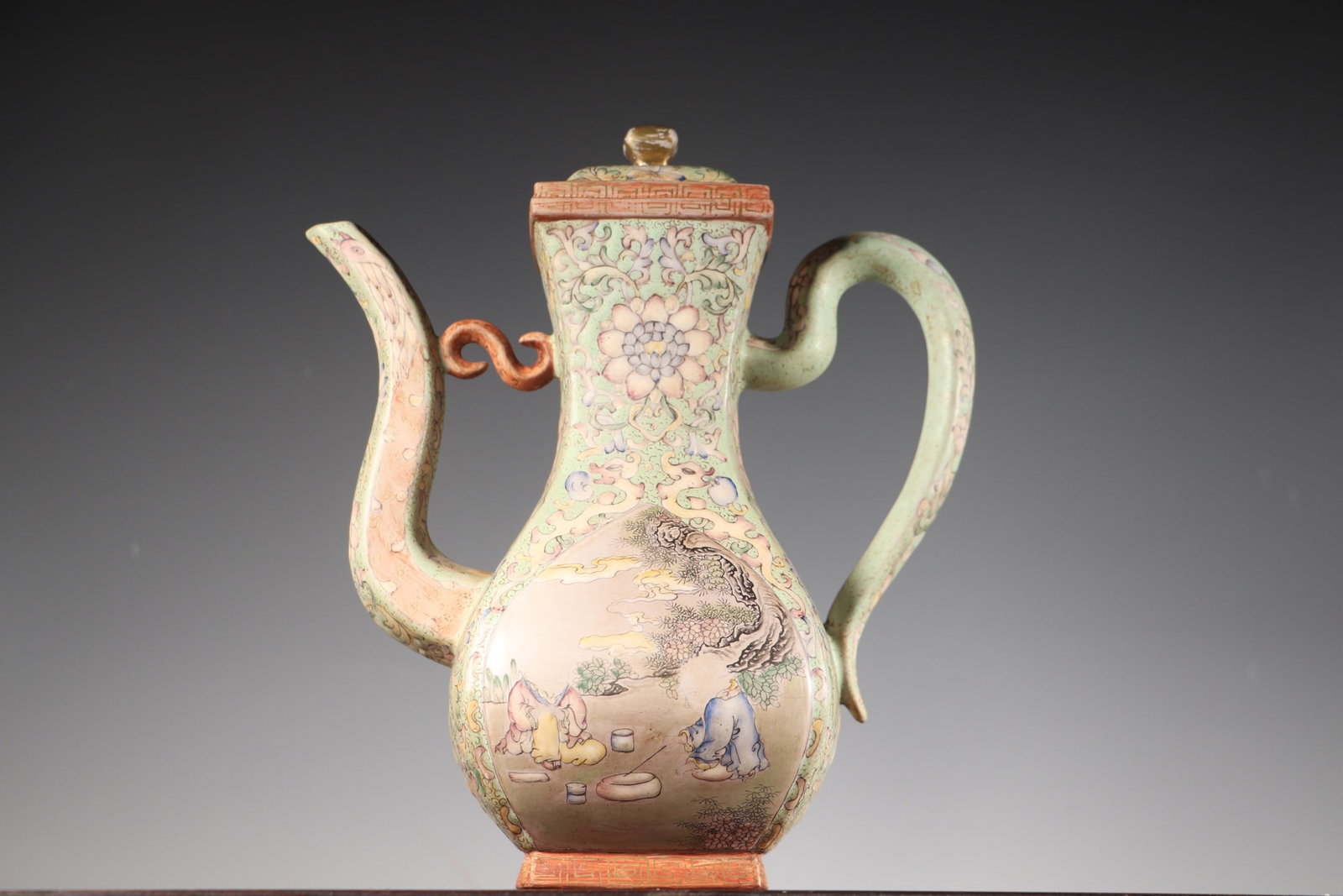 A Exquisite Enamel Figures Pattern Purple Sands Teapot: A Exquisite Enamel Figures Pattern Purple Sands Teapot,Qing Dynasty, China,Qianlong Four-character Mark,Size:7.5inx3.9inx9.3in,Weight:702g