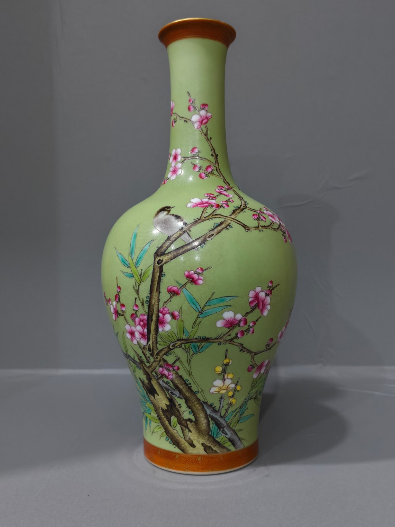 A Exquisite Turquoise-Glazed Famille-Rose Flower and Bird Pattern Vase: A Exquisite Turquoise-Glazed Famille-Rose Flower and Bird Pattern Vase,Qing Dynasty, China,Yongzheng Six-character Mark,Size:13.4inx6.3inx2.4in