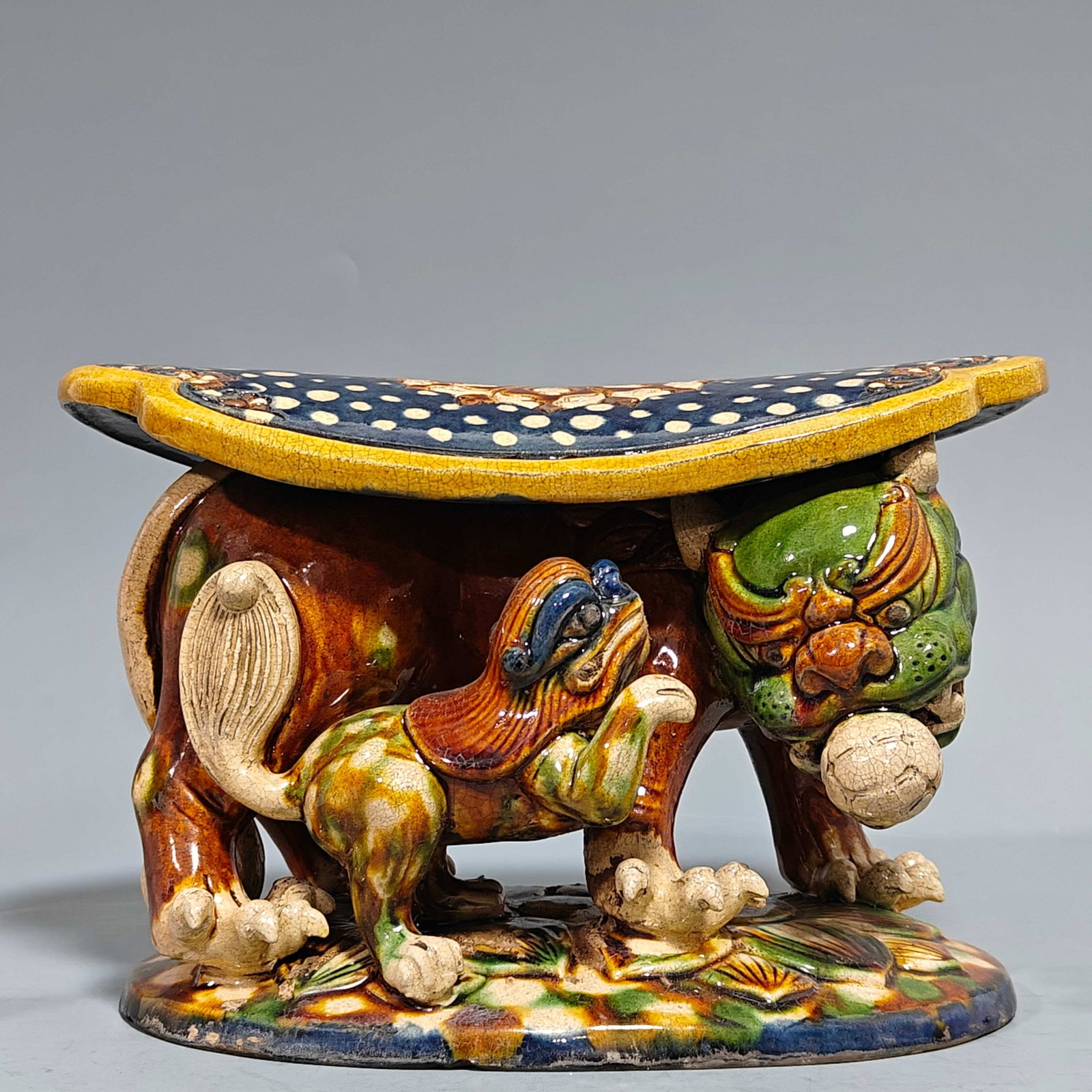 A Exquisite Tri-Color Glazed Lion Ornament: A Exquisite Tri-Color Glazed Lion Ornament,Song Dynasty, China,Size:6.7inx10.6in 三彩狮摆件,中国宋代