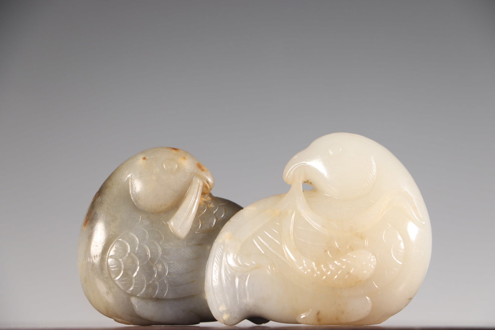 A Exquisite Hotan Jade Blue and White Mandarin Duck Ornament: A Exquisite Hotan Jade Blue and White Mandarin Duck Ornament,Qing Dynasty, China,Size:3.9inx1.3inx2.3in,Weight:229g