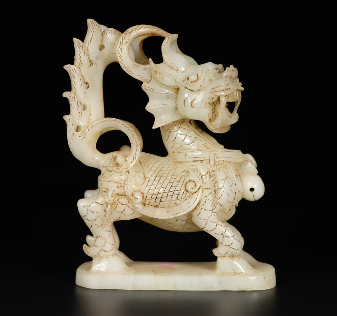A Exquisite Hotan Jade Kylin Ornament: A Exquisite Hotan Jade Kylin Ornament,Han Dynasty, China,Size:4.5inx2.4inx5.7in,Weight:631g 和田玉麒麟摆件,中国汉代