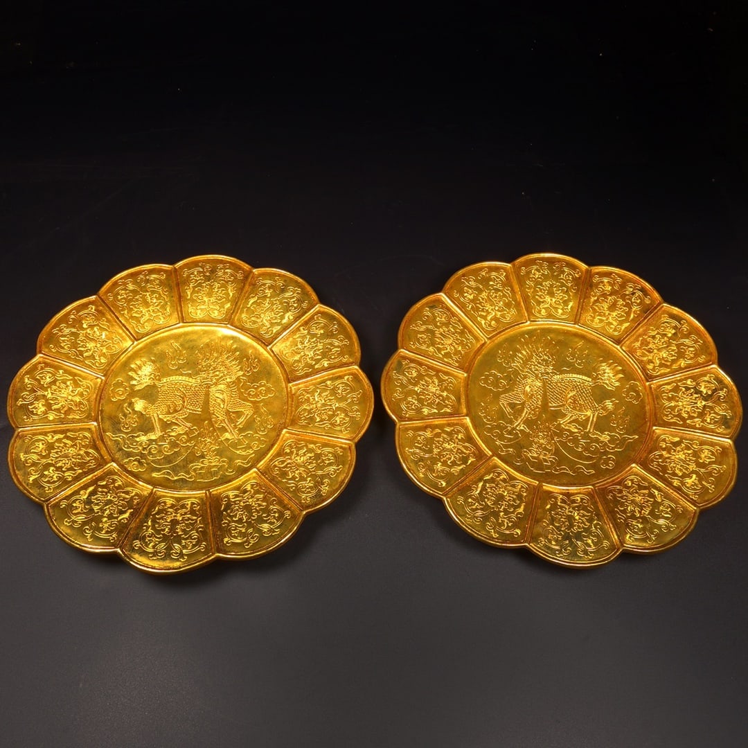 An Exquisite Gilt Bronze Auspicious Beast Pattern Plate: An Exquisite Gilt Bronze Auspicious Beast Pattern Plate Qing Dynasty, China Size:1.4inx10.8in Weight:1351g铜鎏金麒麟糕点盘子