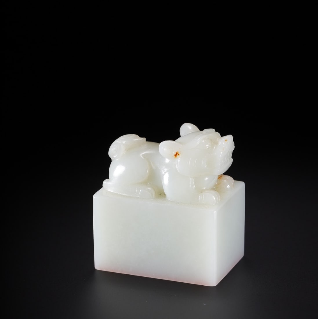 An Exquisite White Jade Auspicious Beast Seal: An Exquisite White Jade Auspicious Beast Seal Qing Dynasty, China Size:1.9inx1.2inx1.8in Weight:112.5g白玉狮钮印章 中国清代