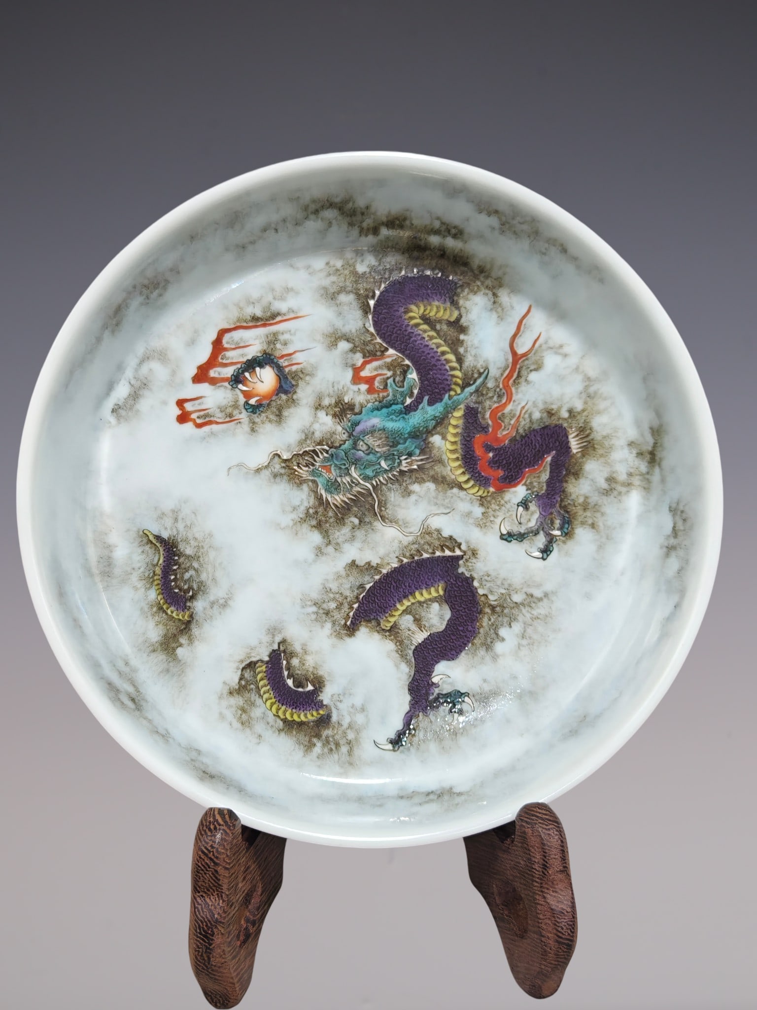 An Exquisite Ink Color Dragon Pattern Plate: An Exquisite Ink Color Dragon Pattern Plate Qing Dynasty, China Yongzheng Four-character Mark Size:1.2inx5.7in墨彩龙纹壶承 中国清代