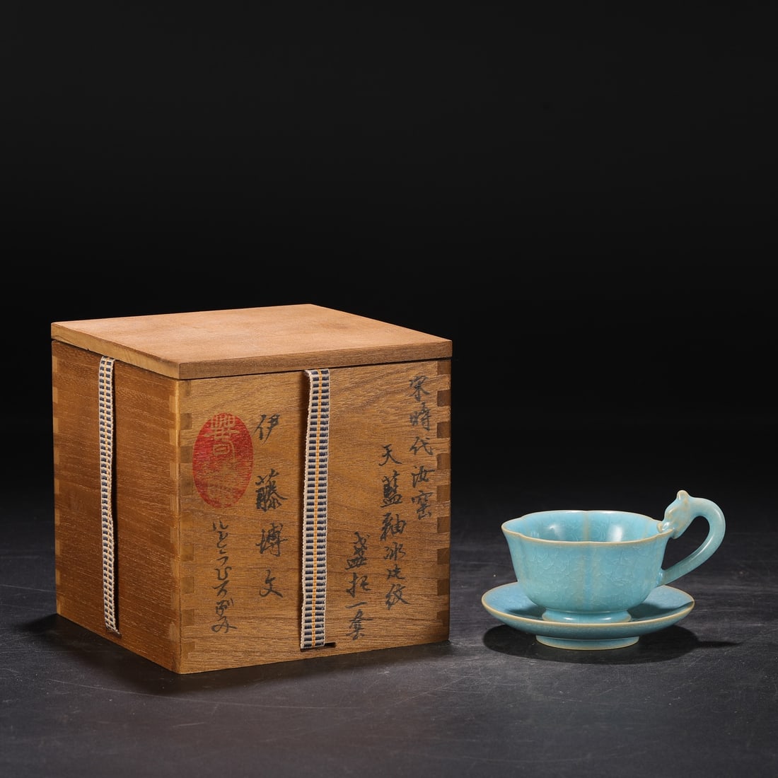 An Exquisite Ru yao Cup: An Exquisite Ru yao Cup Song Dynasty, China Size:3.1inx4.3in汝窑天蓝釉冰片纹盏托一套 中国宋代 Size:8cmx1