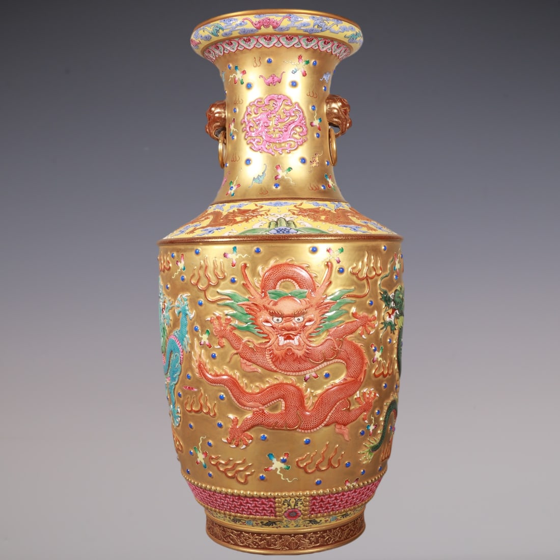 An Exquisite Enamel Dragon Pattern Seawater Pattern Double-Ears Vase: An Exquisite Enamel Dragon Pattern Seawater Pattern Double-Ears Vase Qing Dynasty, China Qianlong Six-character Mark Size:24inx11.4in珐琅彩雕刻金地九