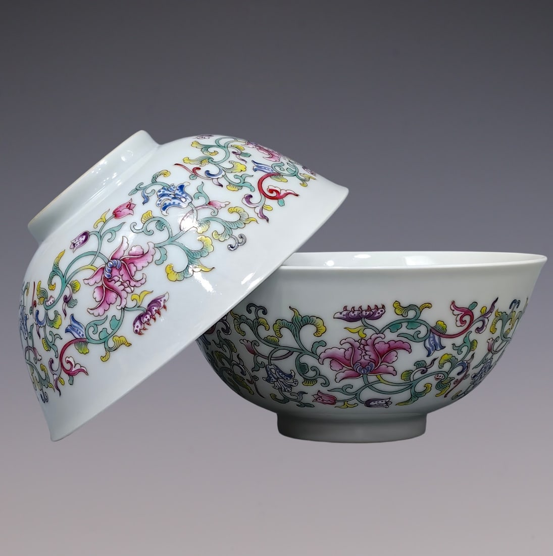 An Exquisite Famille-Rose Lotus Pattern Flower and Fruit Pattern Bowl: An Exquisite Famille-Rose Lotus Pattern Flower and Fruit Pattern Bowl Qing Dynasty, China Qianlong Four-character Mark Size:2.7inx5.9in粉彩缠枝莲图案纹&