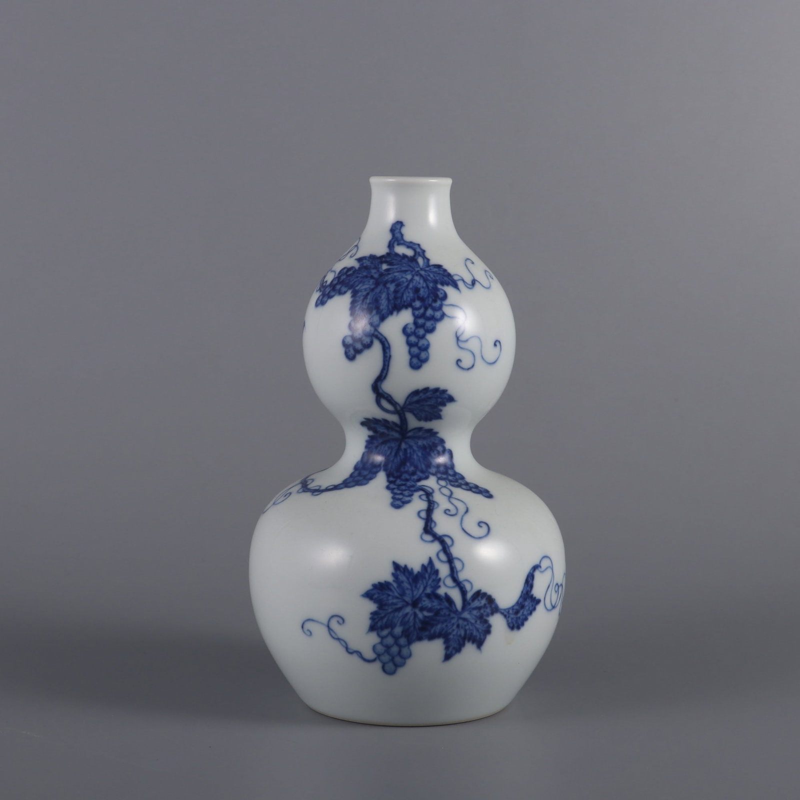 An Exquisite Blue and White Squirrel and Grapes Pattern Gourd-Shaped Vase (1 of 9)