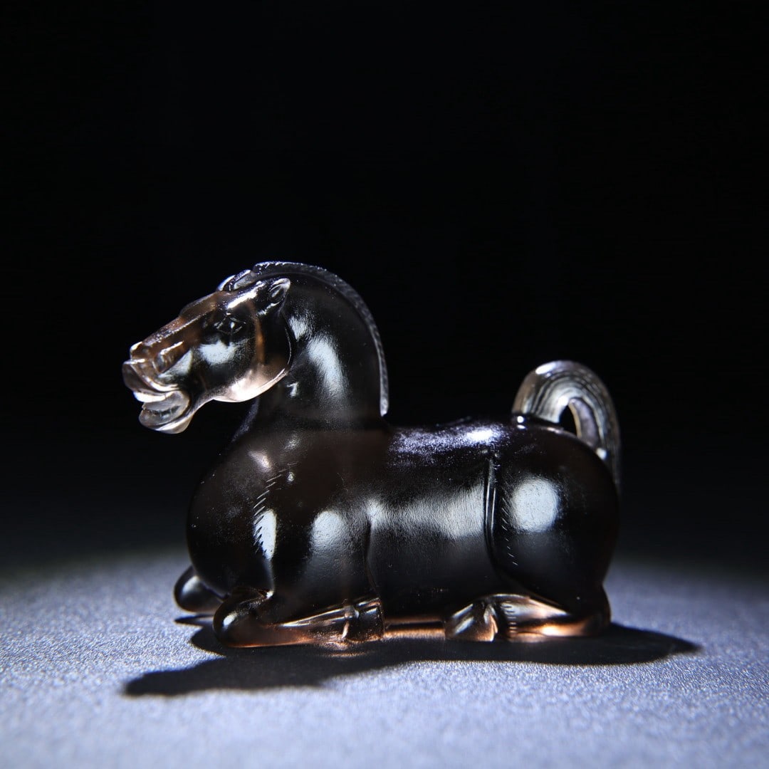 An Exquisite Crystal Horse Hand Piece: An Exquisite Crystal Horse Hand Piece Han Dynasty, China Size:4.1inx2.8inx1.6in Weight:279g水晶马把件 中国汉代 Size:10.3cmx7cmx4cm Weight:279g