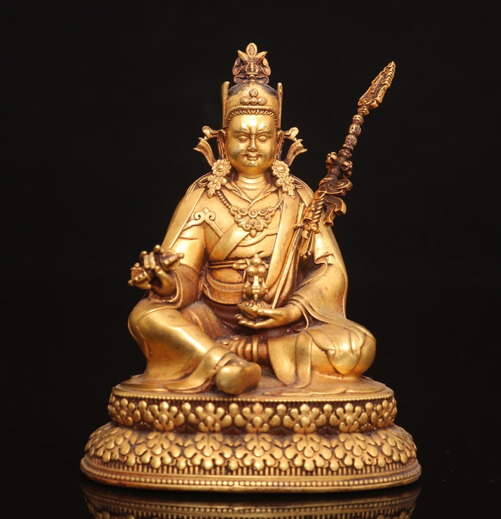An Exquisite Gilt Bronze Statue of Padma Sambhava Ornament: An Exquisite Gilt Bronze Statue of Padma Sambhava Ornament Ming Dynasty, China Size:3.9inx3.1in Weight:634g铜鎏金莲花佛大士摆件 中