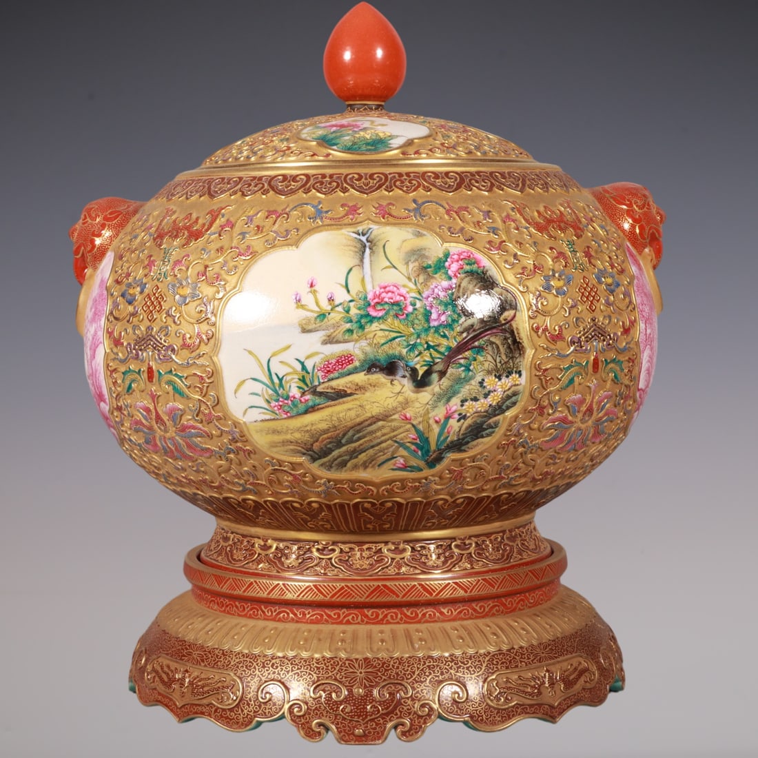 An Exquisite Enamel Lotus Pattern Flower and Bird Pattern Double-Ears Jar: An Exquisite Enamel Lotus Pattern Flower and Bird Pattern Double-Ears Jar Qing Dynasty, China Qianlong Six-character Mark Size:9.4inx7.9in珐琅彩雕刻缠枝ഫ