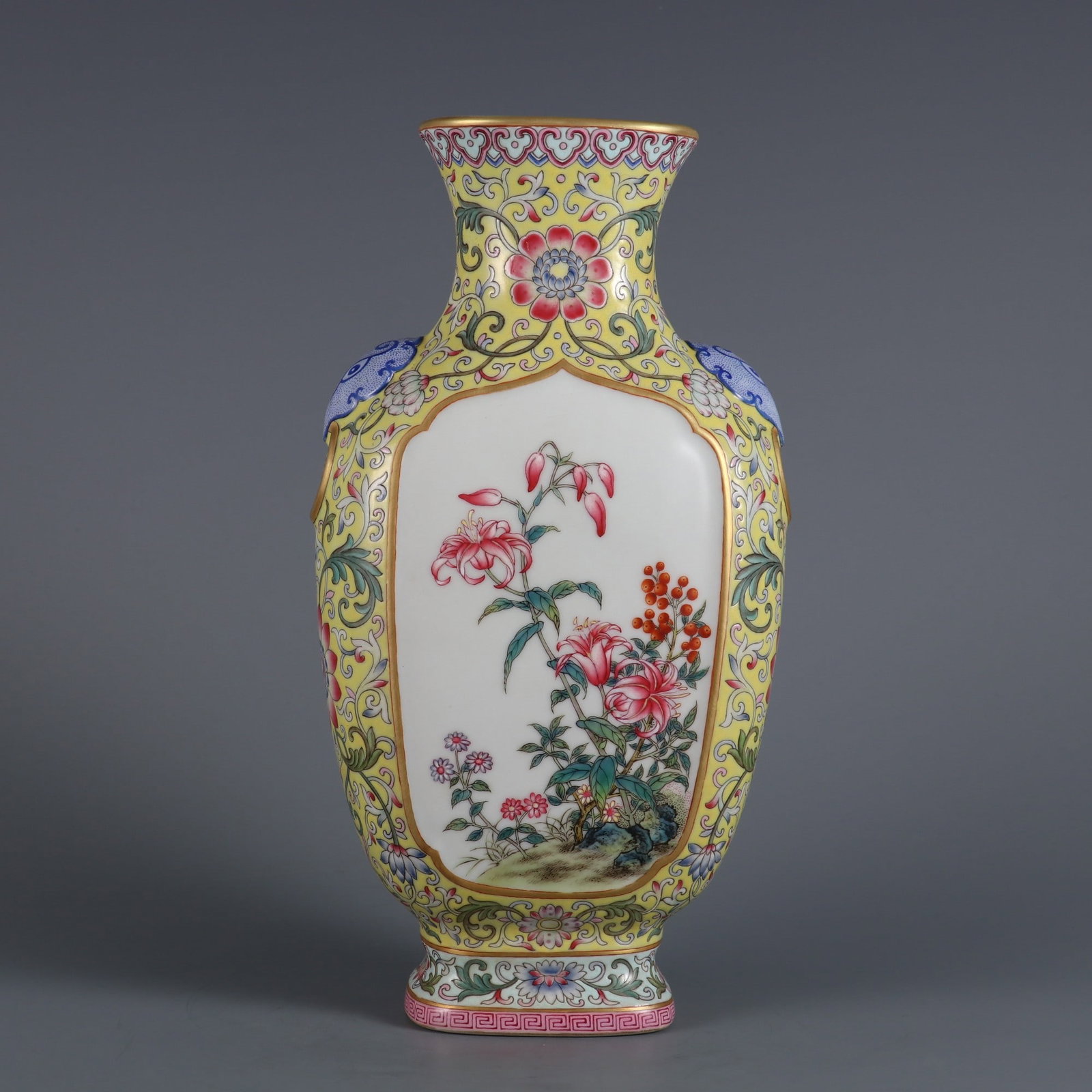 An Exquisite Famille-Rose Flower Pattern Lotus Pattern Double-Ears Vase: An Exquisite Famille-Rose Flower Pattern Lotus Pattern Double-Ears Vase Qing Dynasty, China Qianlong Six-character Mark Size:9.8in黄地开窗粉彩花卉ಬ