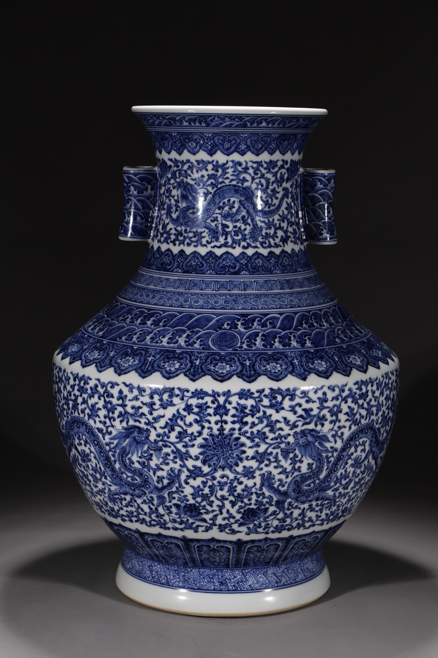 An Exquisite Blue and White Lotus Pattern Dragon Pattern Seawater Pattern Double-Ears Vase: An Exquisite Blue and White Lotus Pattern Dragon Pattern Seawater Pattern Double-Ears Vase Qing Dynasty, China Qianlong Six-character Mark
